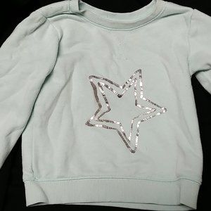 Teal Sweatshirt with a Silver Star in the Center